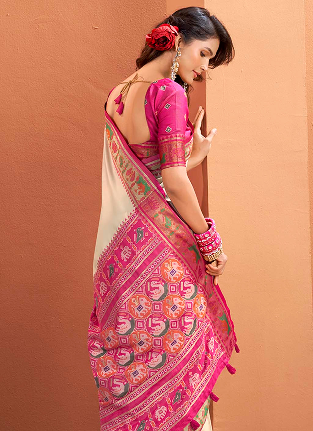 The Ivory & Rani Pink Heritage Patola Silk Saree