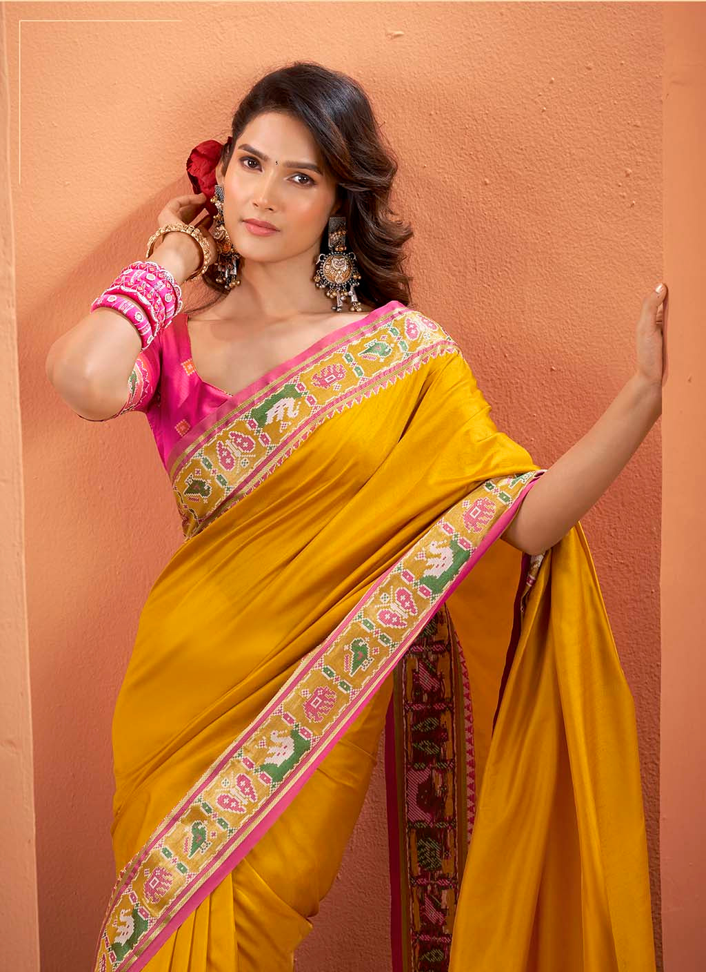 Mustard Yellow and Magenta Silk Patola Saree