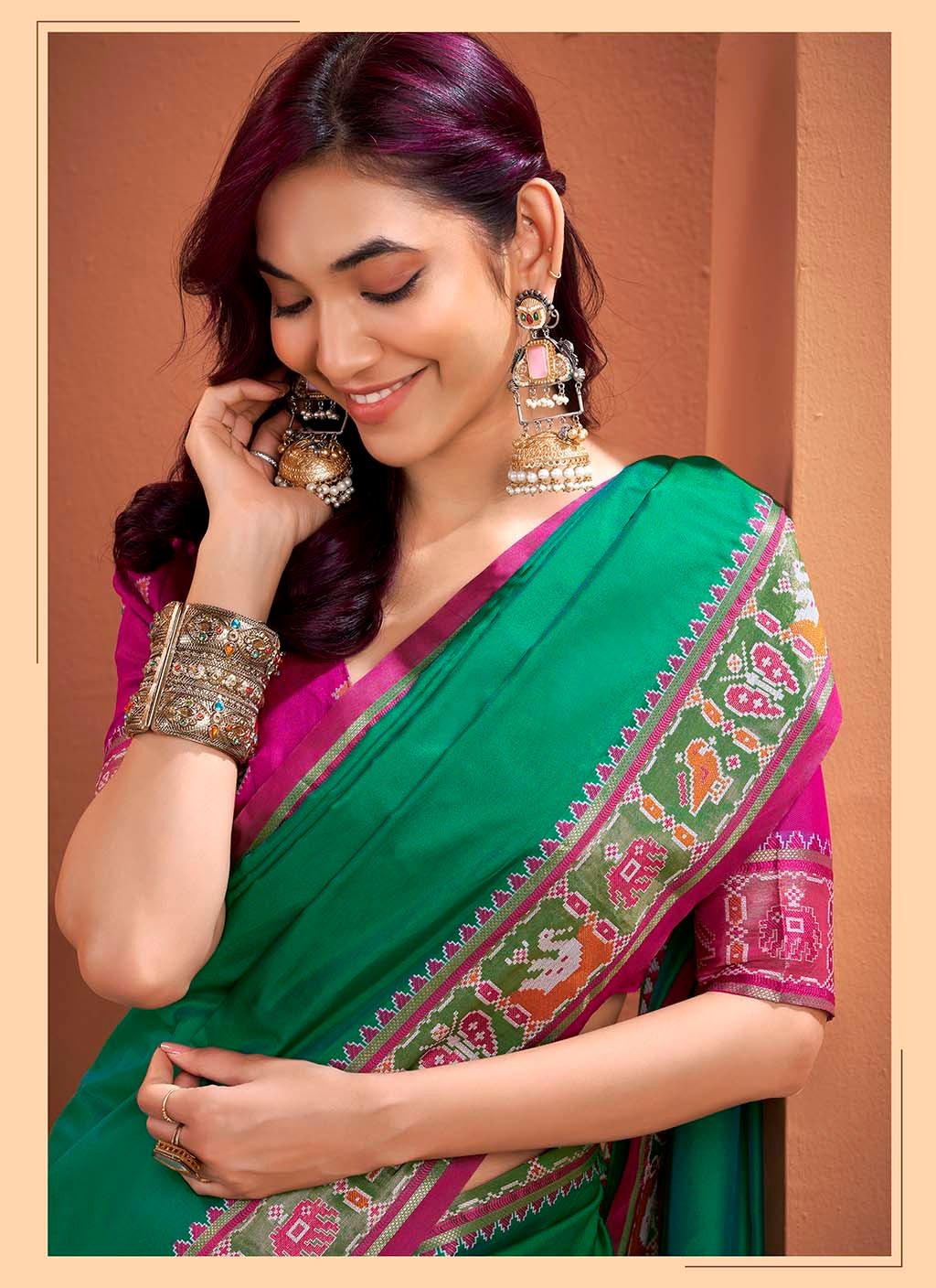 Emerald Green and Magenta Silk Patola Saree