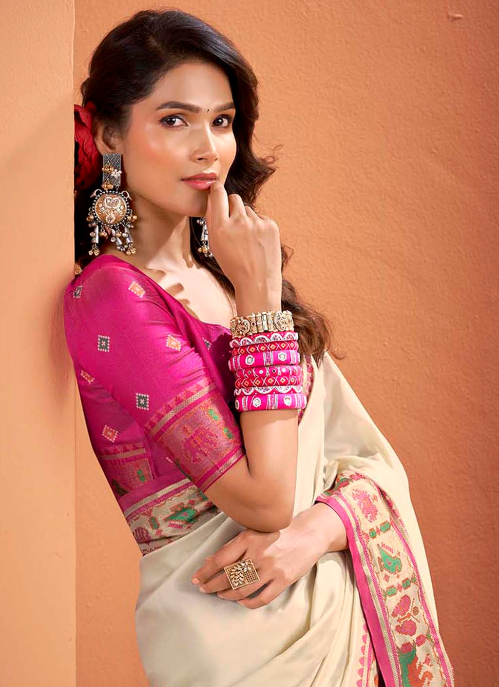 The Ivory & Rani Pink Heritage Patola Silk Saree