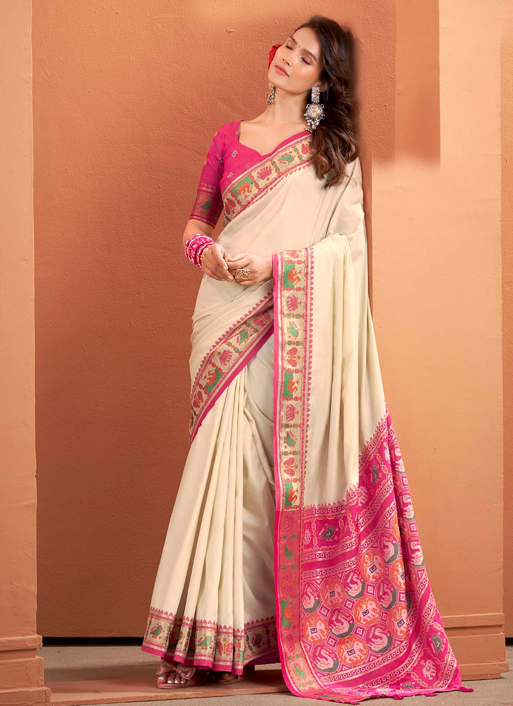 The Ivory & Rani Pink Heritage Patola Silk Saree