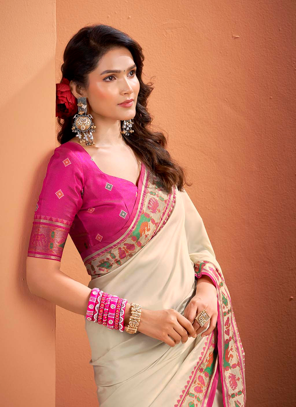 The Ivory & Rani Pink Heritage Patola Silk Saree